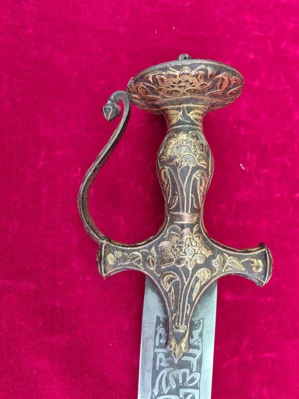 A fine 19th Century Indian sword Tulwar with Bronze inlay to the hilt unusual blade marking Ref 3264